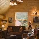 Sitting room in loft of log home