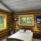 Bedroom in handcrafted log cabin