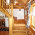 Log staircase in log cabin