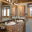Vanity in log home bathroom
