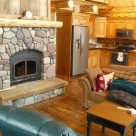 Fireplace insert in log cabin