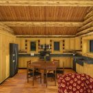 Kitchen and dining in log cabin.